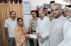 Priyank Kharge hands over Rs 1 lakh to family of cop who succumbed to heart attack